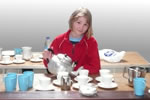 Someone pouring tea